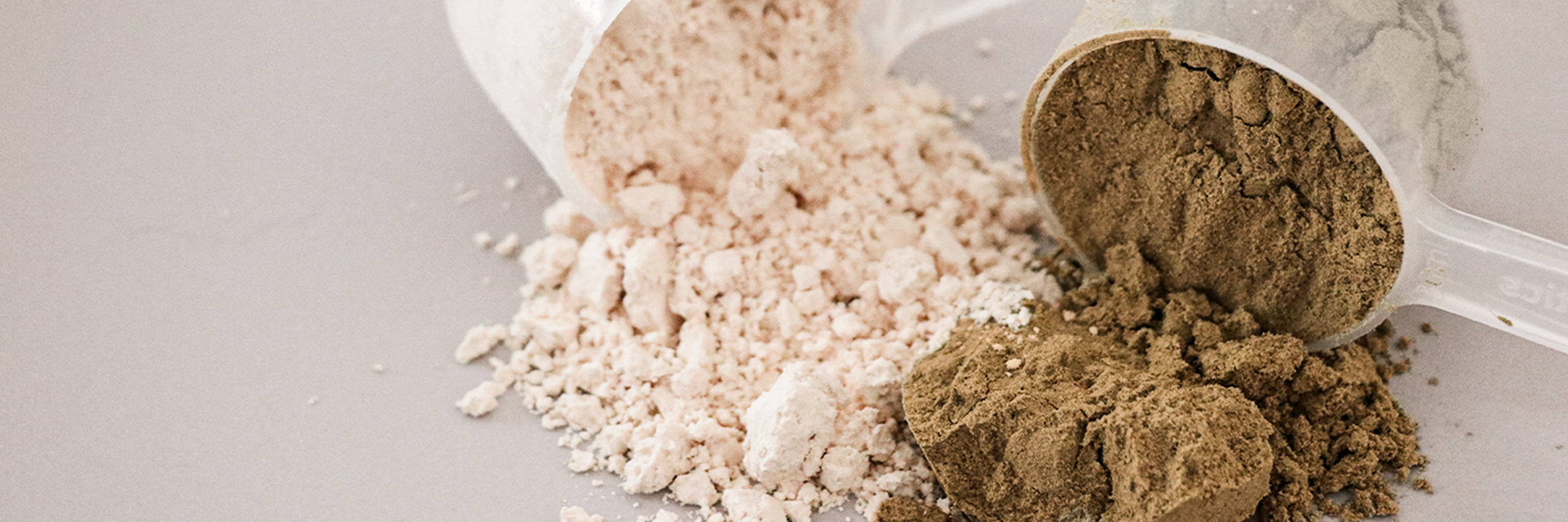 Protein powder supplement scoops